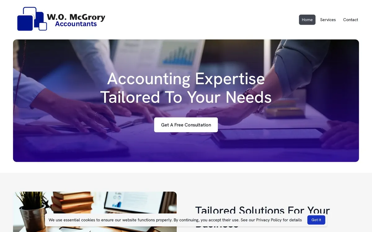 W.O. McGrory & Company website shown on a laptop